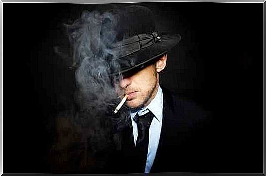 man in hat smoking