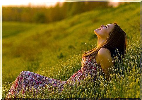 woman smiling in the field