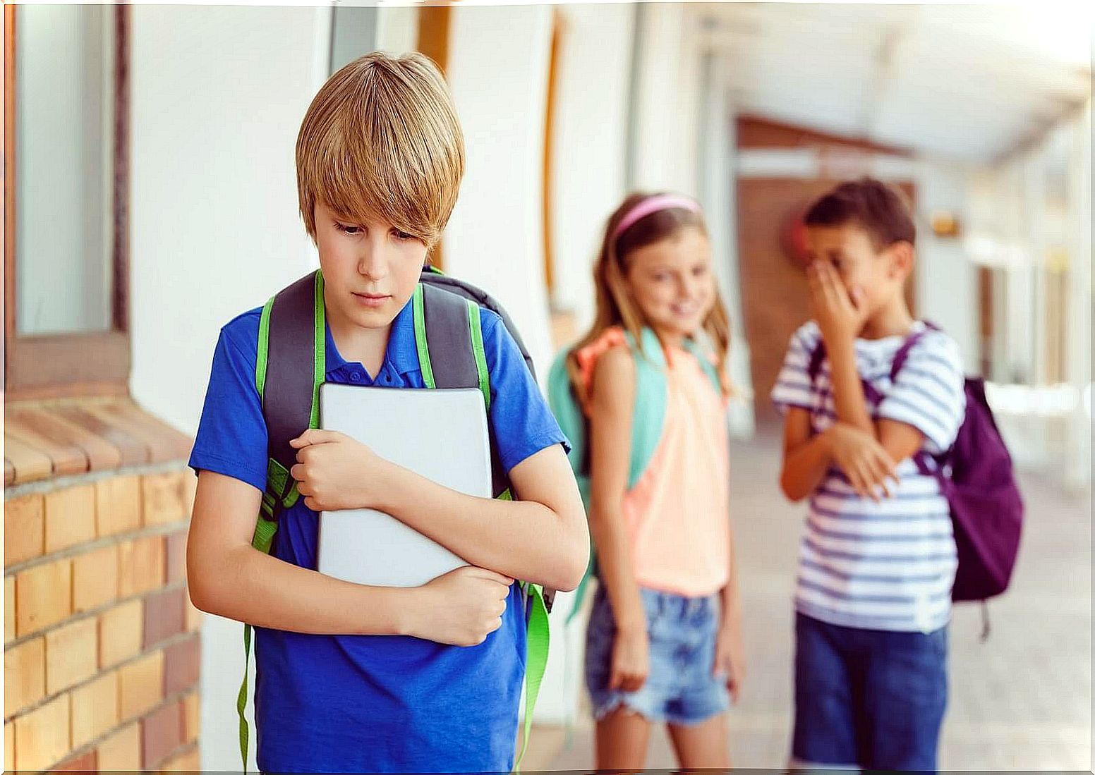 children mocking a boy