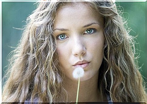 woman with dandelion