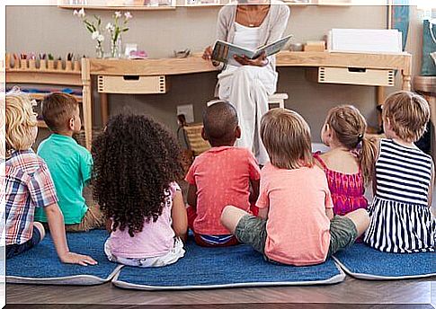 teacher reading story to students