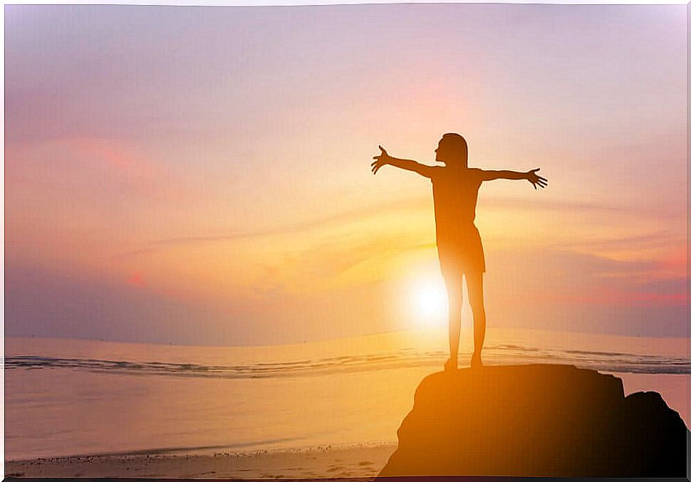 woman enjoying the sunset.