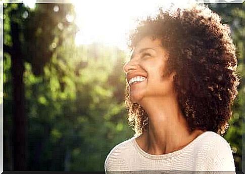 woman smiling optimistically