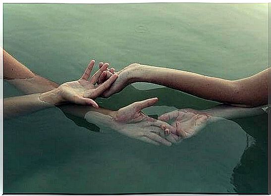 hands-interlaced-water