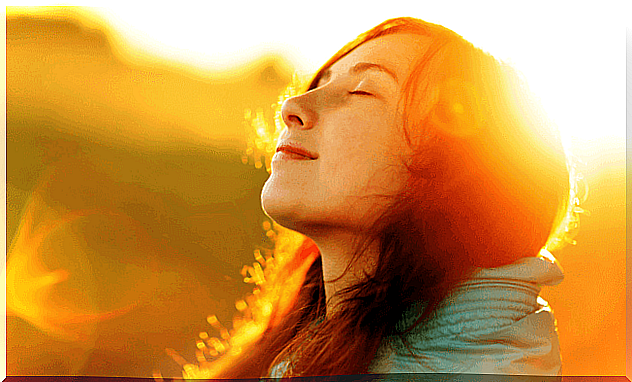 woman breathing fresh air